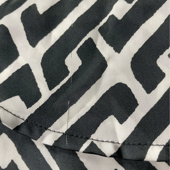 INC International Concepts Black and Cream patterned blouse. Roll tab sleeves. - Picture 9 of 9